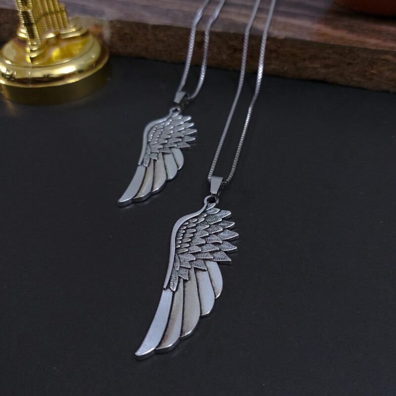 Feather Fly Pendant .